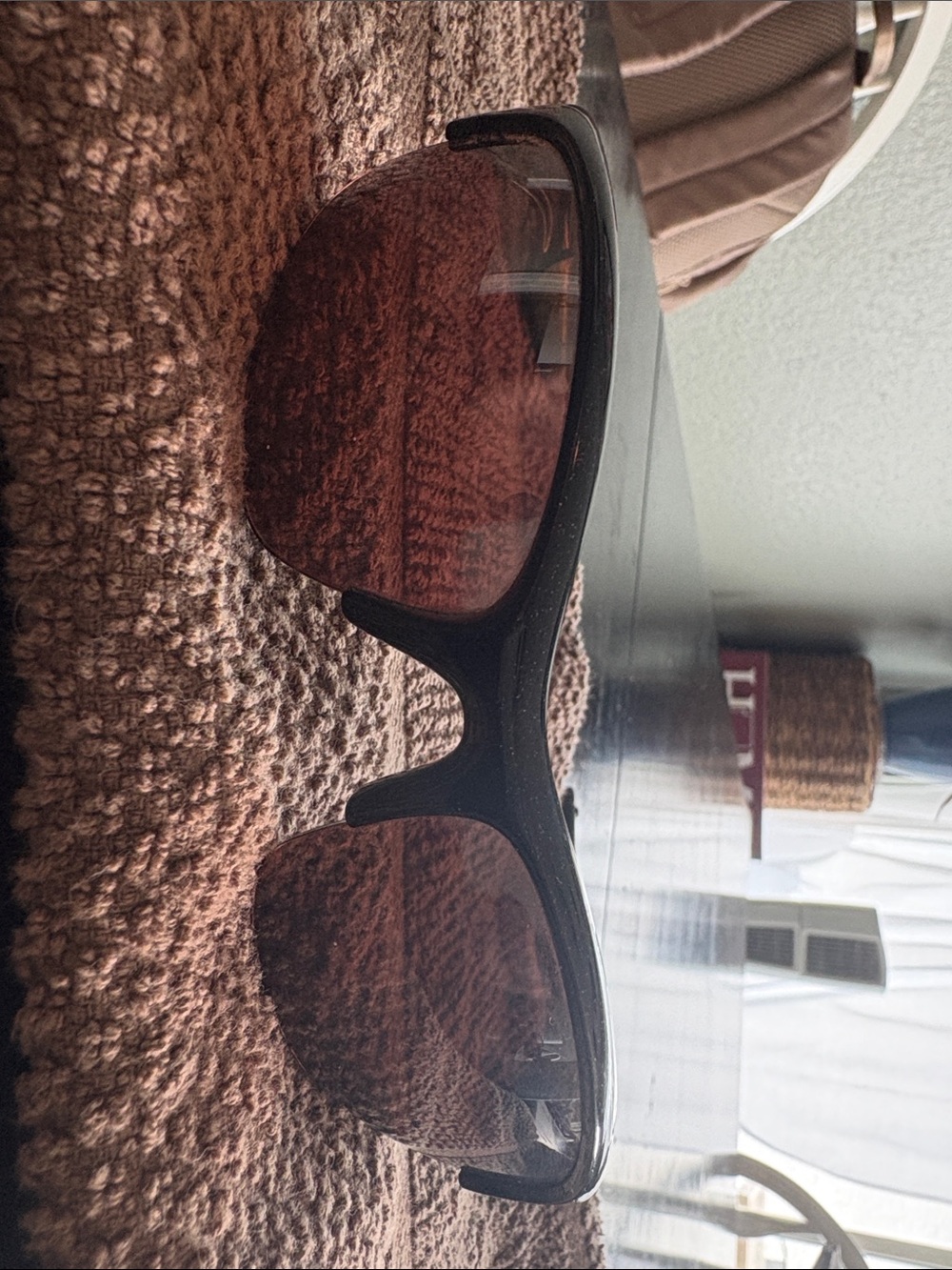 Oakley Bottle Rocket- Sporty Black Frame Sunglasses with Brown Lenses